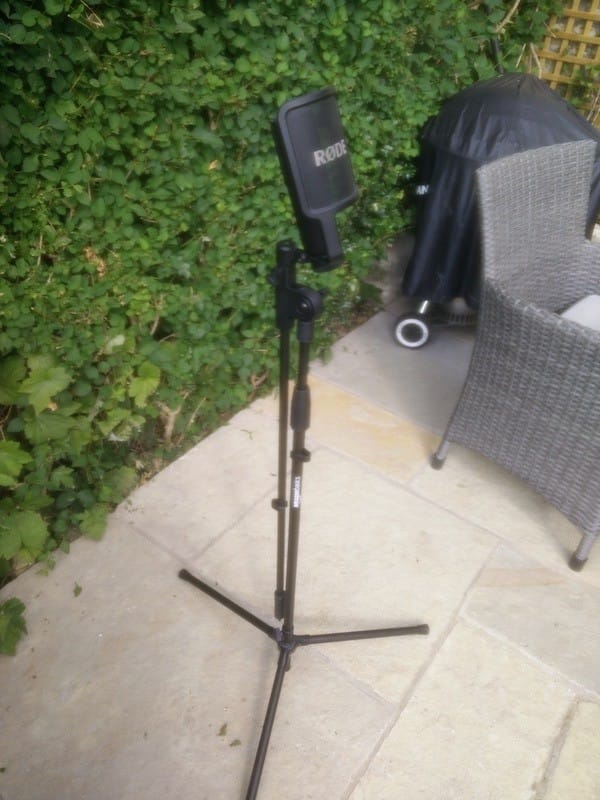 Image of microphone boom stand in an up right position